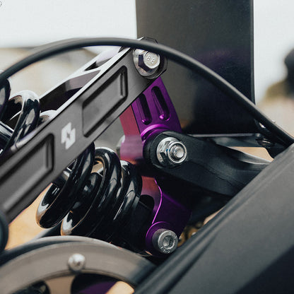 Full-E Charged Reinforced Suspension Linkage With Roller Bearings Purple